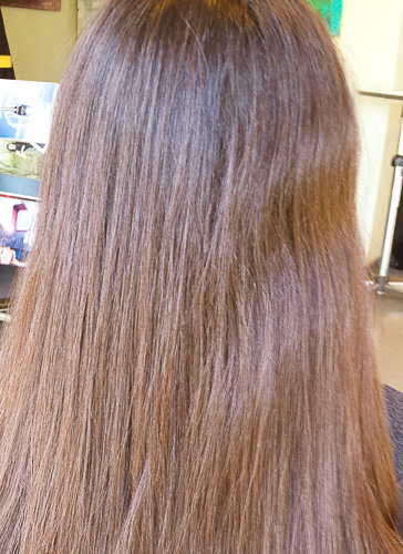 Lady hair before straightening treatment
